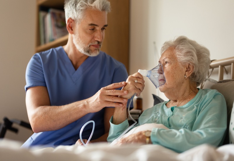Senior patient receiving ventilator care support from a healthcare provider in Glenview, IL